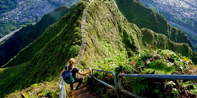 women climbing a mountain