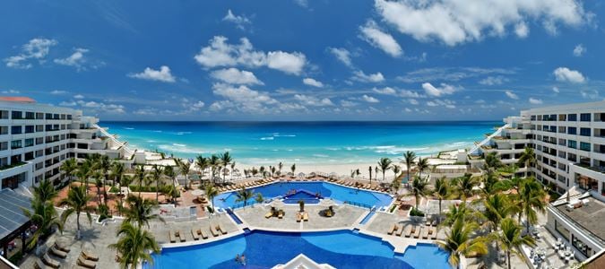 aerial view of hotel and pool 